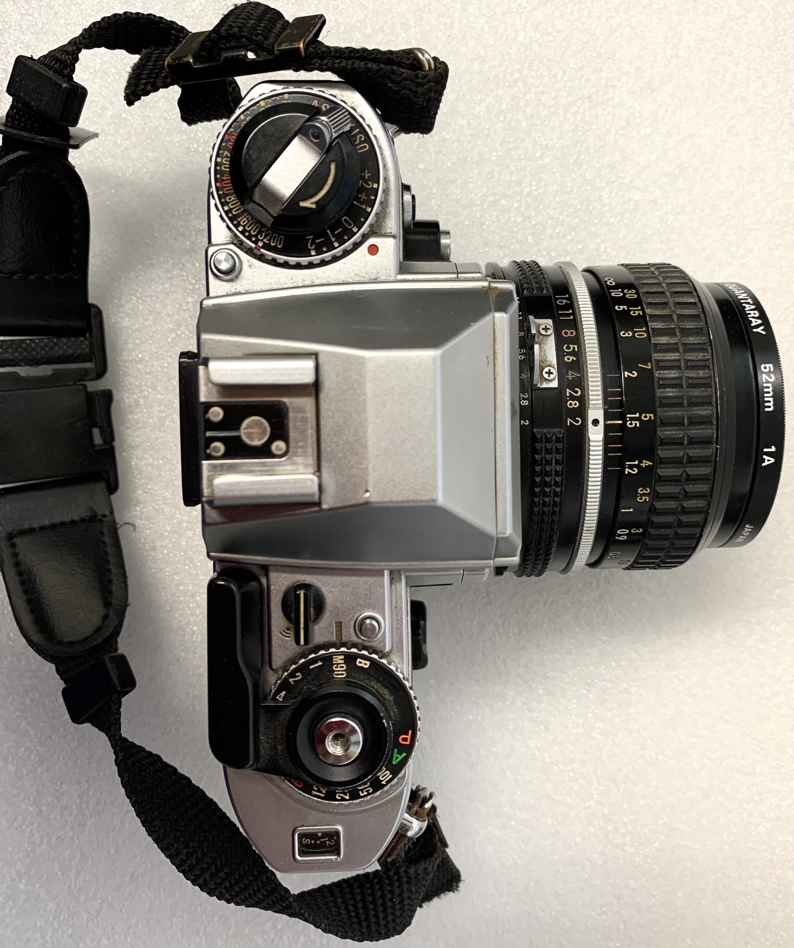 Vintage Nikon FG 35 mm SLR Film Camera with Nikon 50 mm Lens & Rokinon 2000 Camera Flash