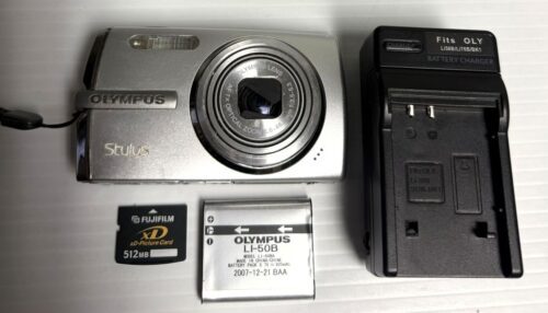 Olympus Stylus 1010 Digital Camera 10.1MP 7x Optical Zoom 2.7" LCD (Silver) (USED)